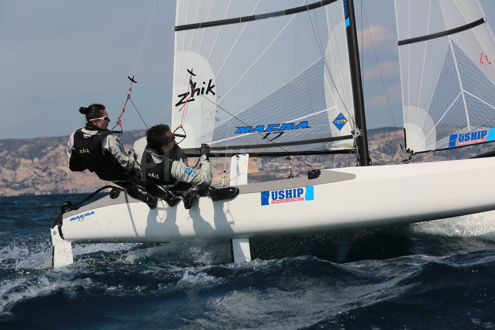 Ingrid Petitjean et Olivier Backes lors du baptême de leur Nacra 17 à la SNM. En route pour les JO de Rio